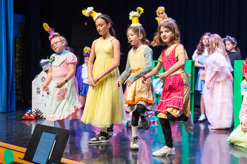 Students in a Wizard of Oz performance